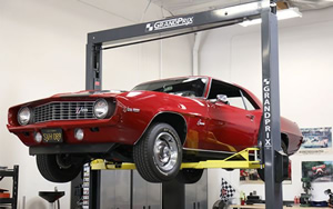 photo of Classic car on service lift